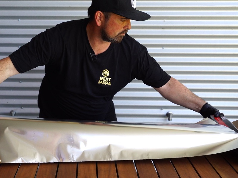 Roll out a full arms width of heavy-duty foil.