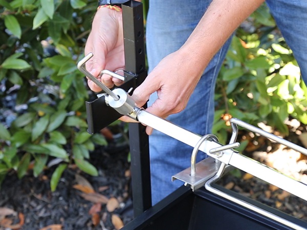 Adjust the height of the rod if the meat cooks too quickly.