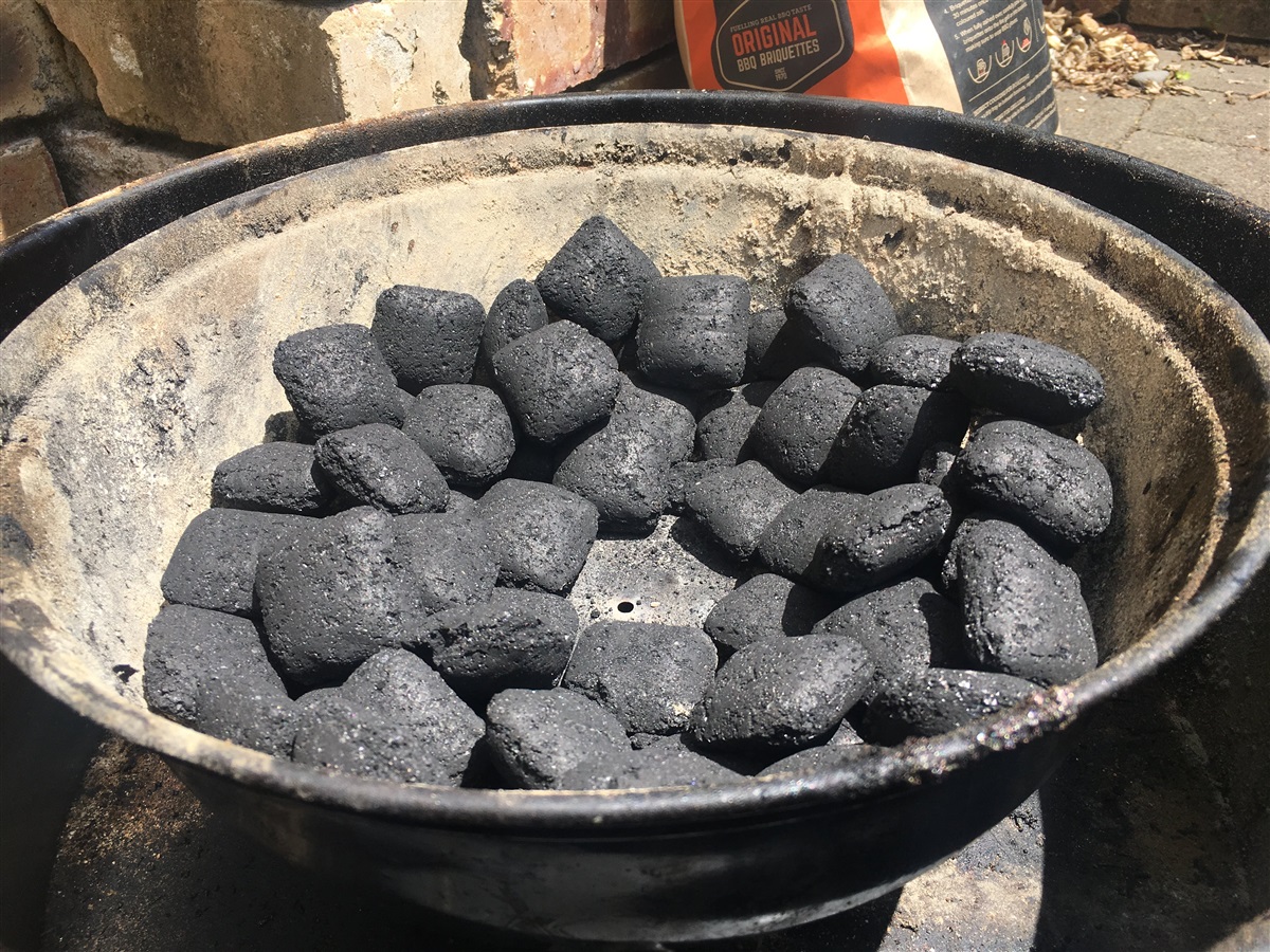 Fill Stack charcoal basket with ⅓ Heatbeads, leaving a 'well' in the middle.