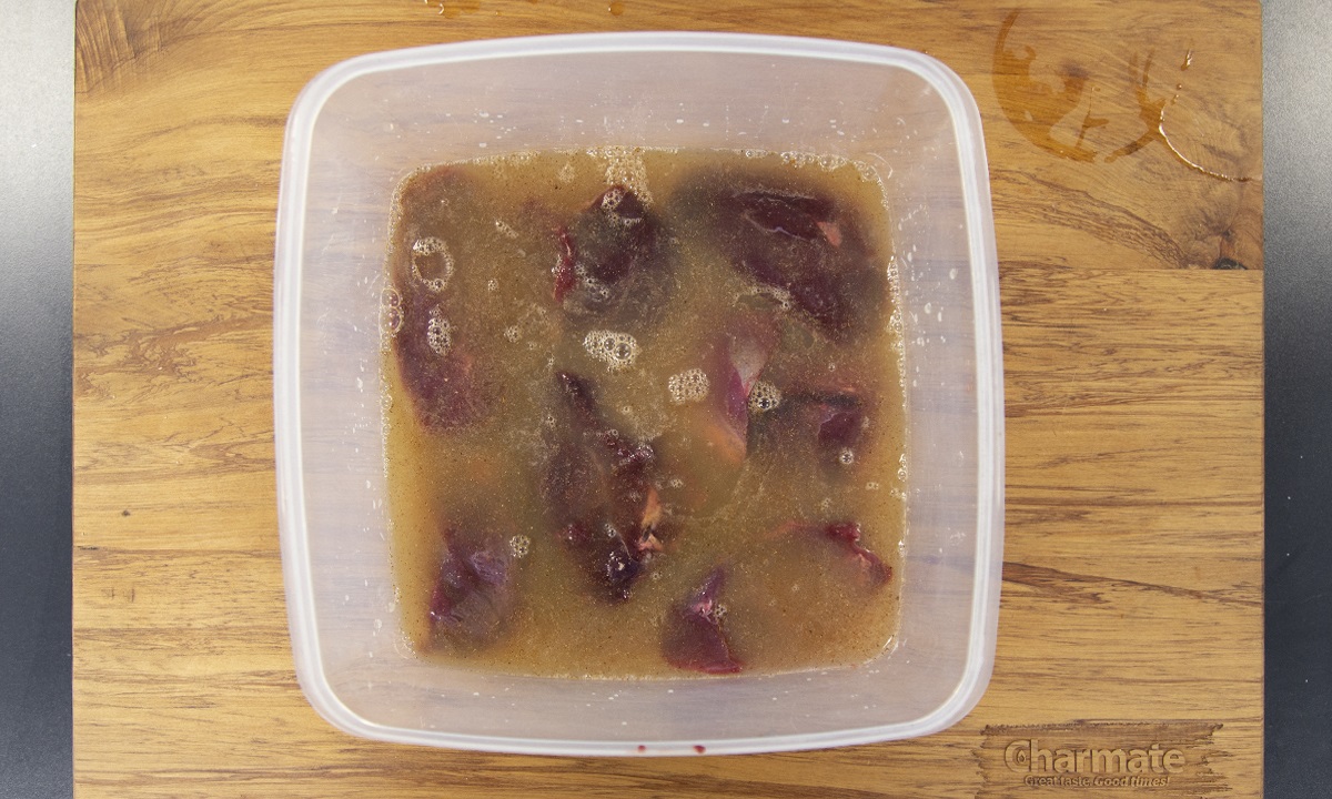 Submerge duck in brine, cover and refrigerate.